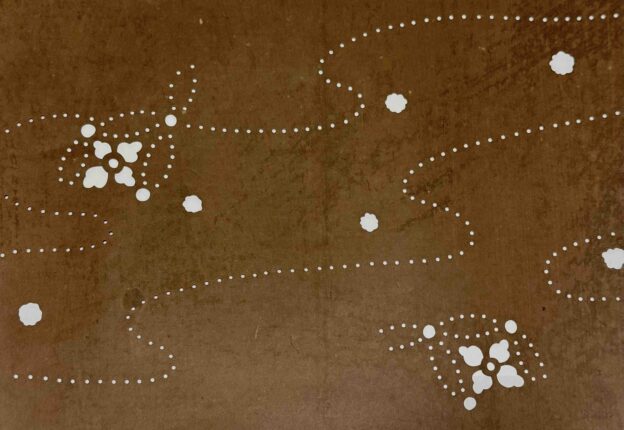 柿渋が塗られた渋紙に彫られた染め型紙